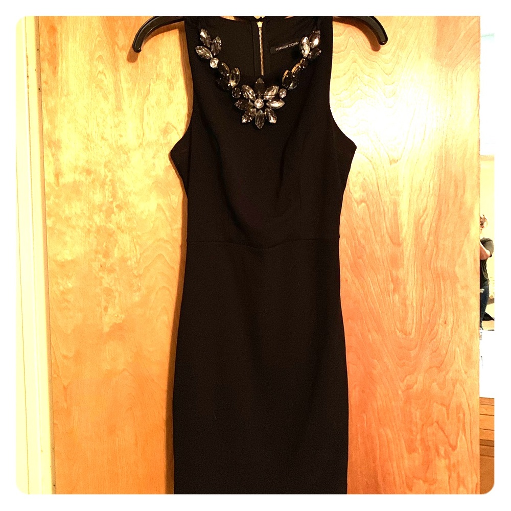 Black dress with jewel necklace